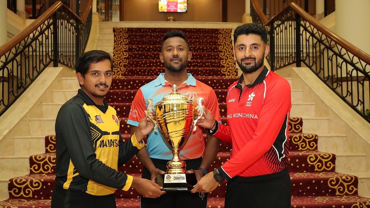 Photo: X | Kausthub Gudipati : Hong Kong, Kuwait and Malaysia captains with the Malaysia T20I Tri-Nations Cup 2024 trophy.